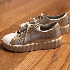 The Shoe Box gold and silver sneakers
